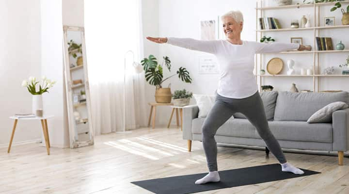 Older woman doing yoga